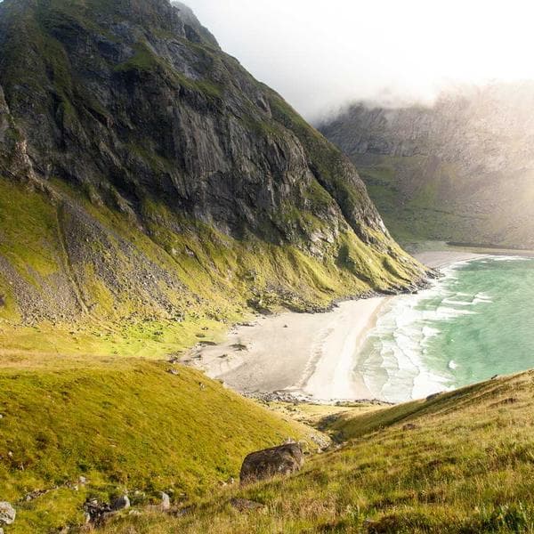 Dancers in colorful costumes during a Sangeet performance.