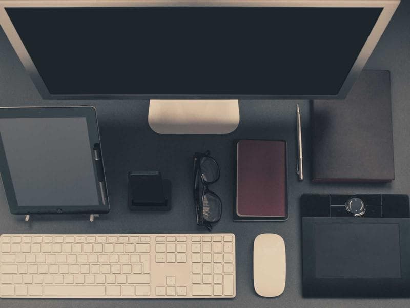 An Indian wedding sangeet ceremony with people dancing joyfully.